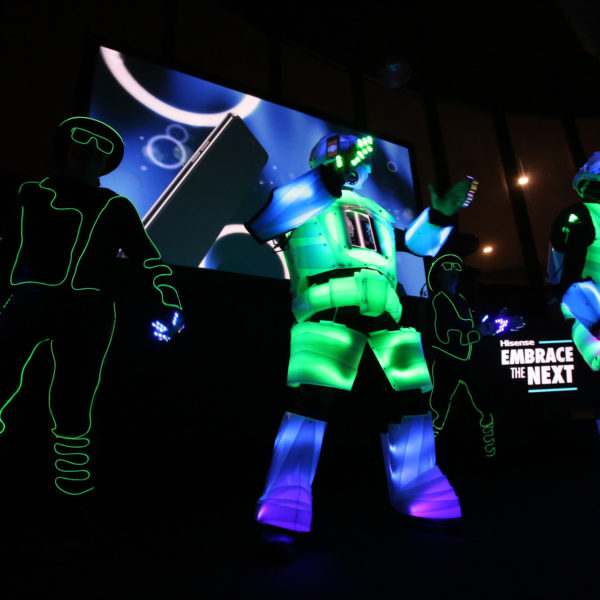 Glowing robot performing on stage during the product launch at MWC in Barcelona