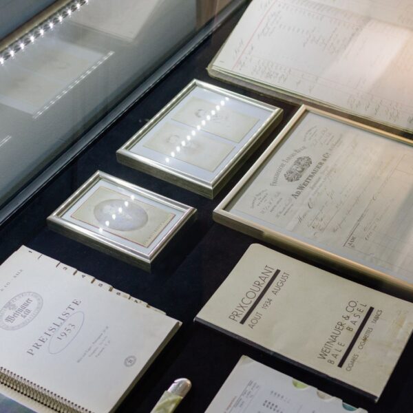 Museum glass case with historical documentation over the years