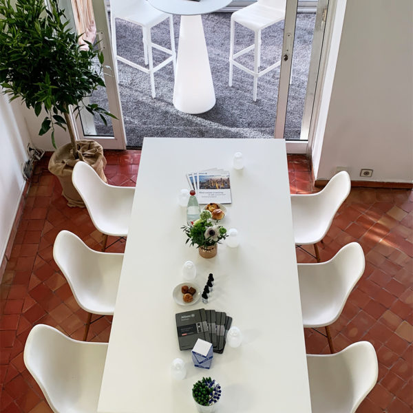 Table with chairs in apartment in Cannes