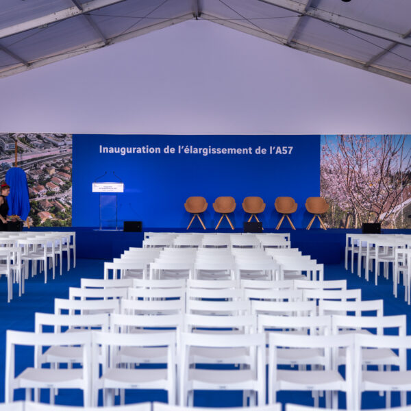Conference tent area with 500 chairs, a long backdrop, stern and seats on stage for the press conference and the official representatives