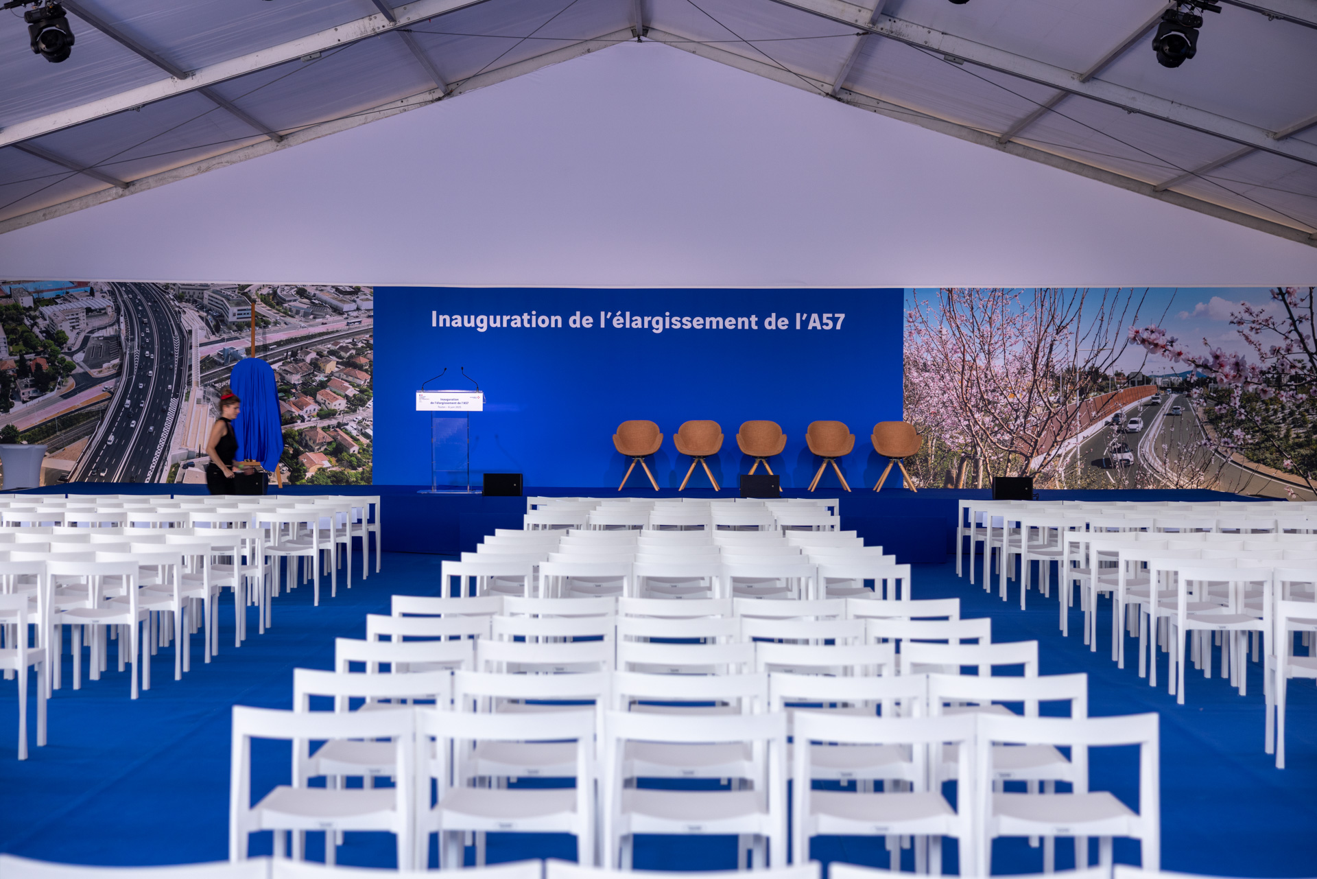 Conference tent area with 500 chairs, a long backdrop, stern and seats on stage for the press conference and the official representatives