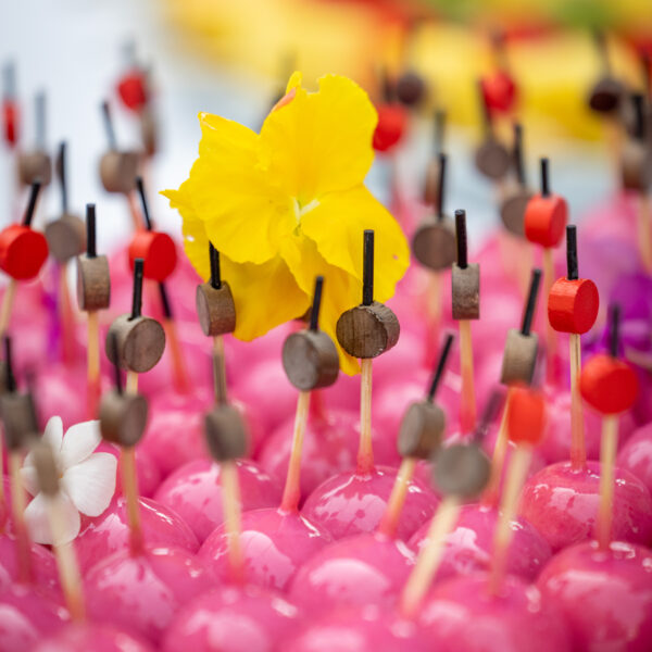 Colorful sweet cocktail pieces served after the press conference