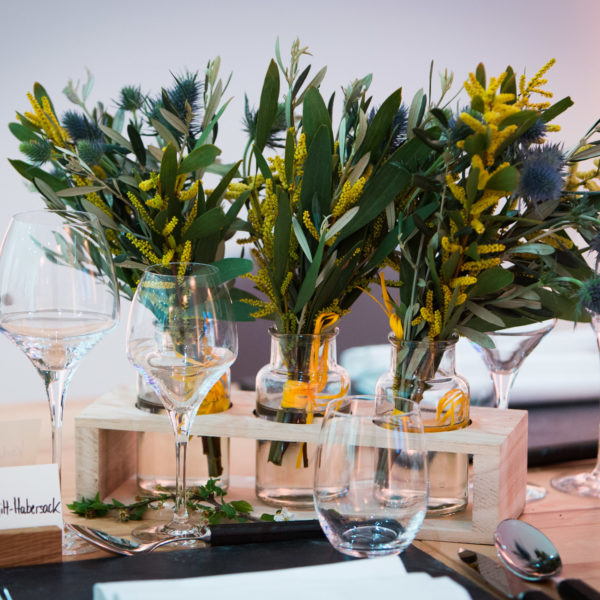 Mimosa and olive tree bouquets center pieces during exclusive dinner with private chef on the Croisette during MIPIM