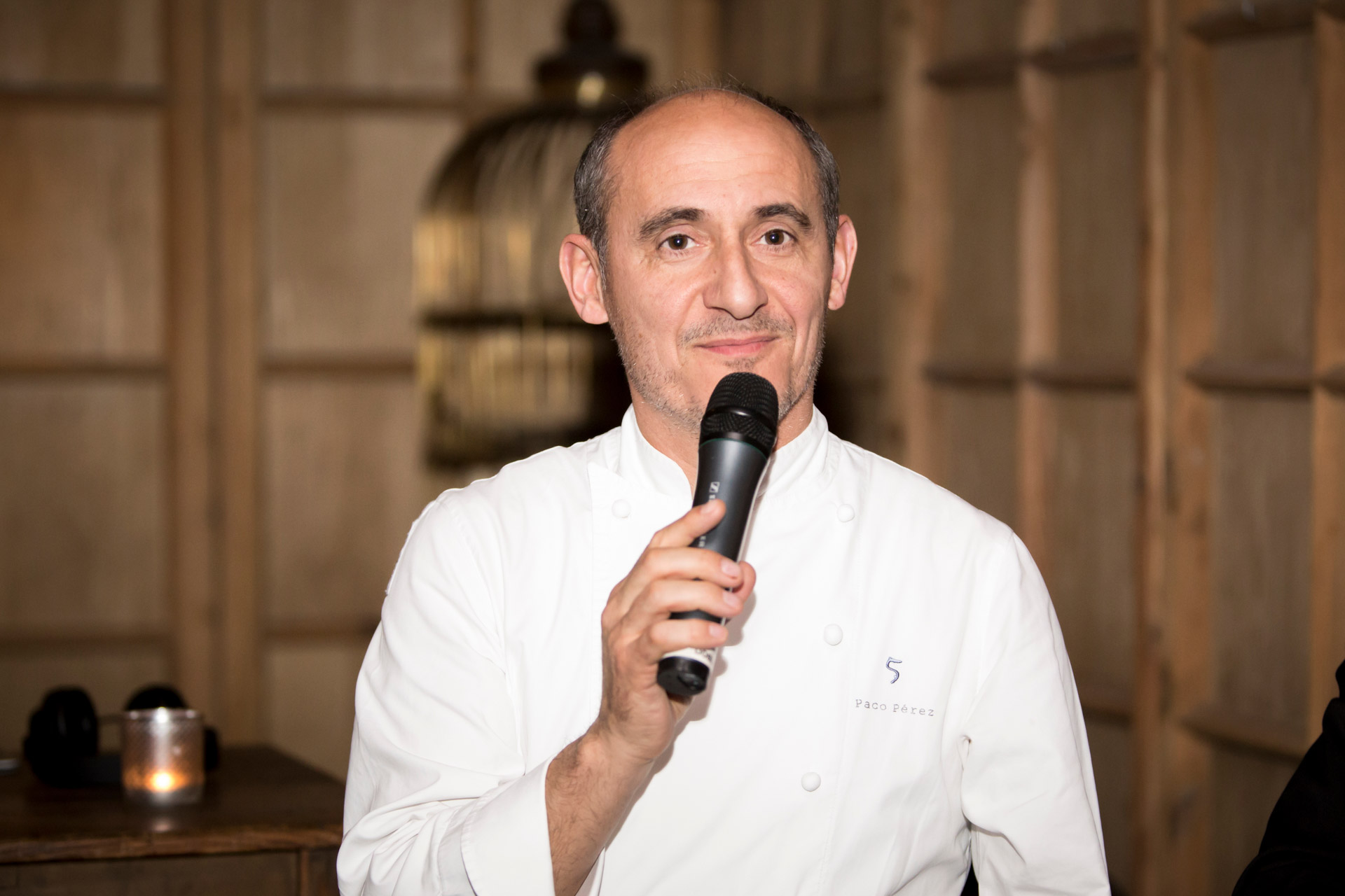 Paco Perez the 5 michelin stars chef coming to salute the guests at the end of the event in Barcelona during MWC