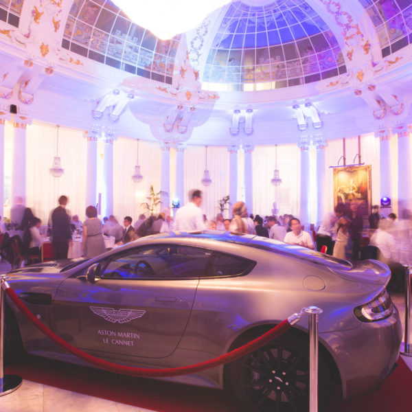 Le Negresco venue with Aston Martin in the center casino royal them party