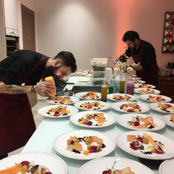 Private chef preparing plates during an exclusive dinner during MIPIM