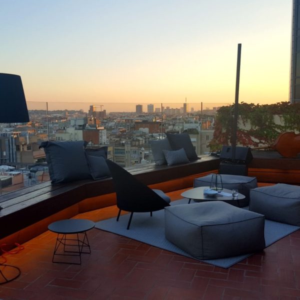 sunset from the rooftop with lounge decoration