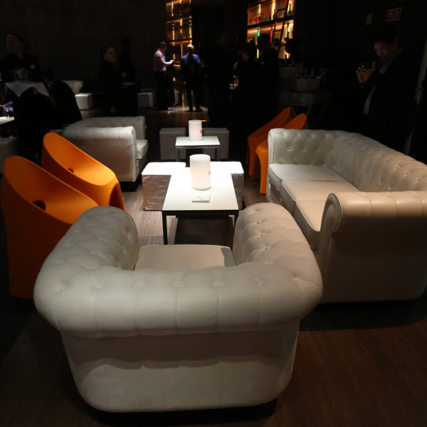 Lounge area arranged in the restaurant for a networking cocktail facing the congress