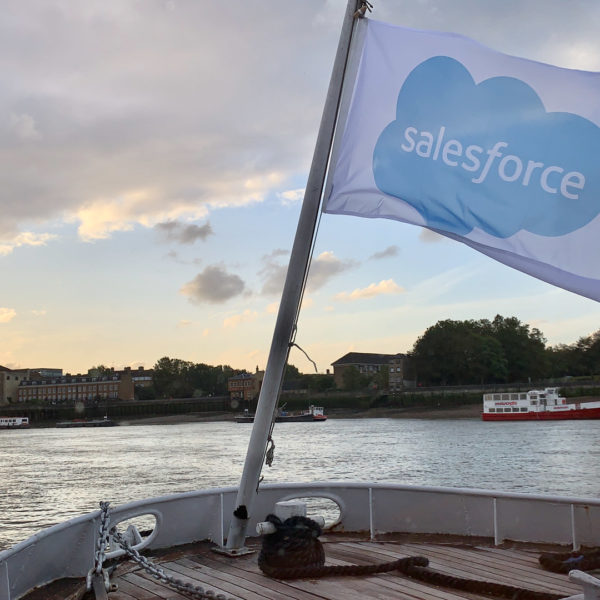 Flag at the back of the barge on the Thames during cruise dinner with customer during the roadshow