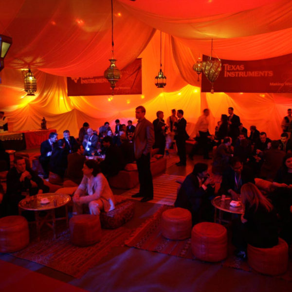 orange warm colours reflected on the tent in the netwokring lounge during the theme party in Barcelona MWC One Thousand and One Nights theme party