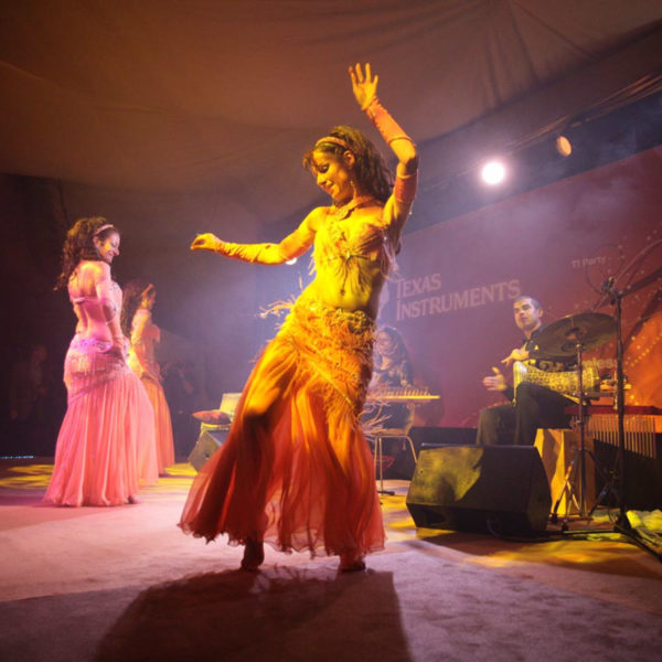 Belly dancing on stage during the One Thousand and One Nights theme party
