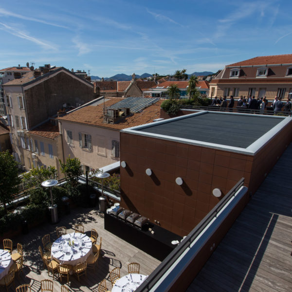 OUtdoor overview of the building with a lunch set-up near Le Palais des Festivals