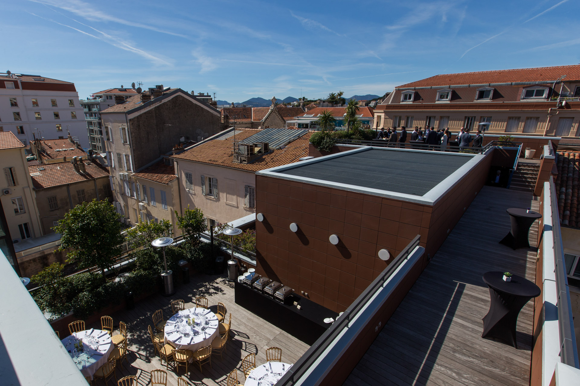 OUtdoor overview of the building with a lunch set-up near Le Palais des Festivals