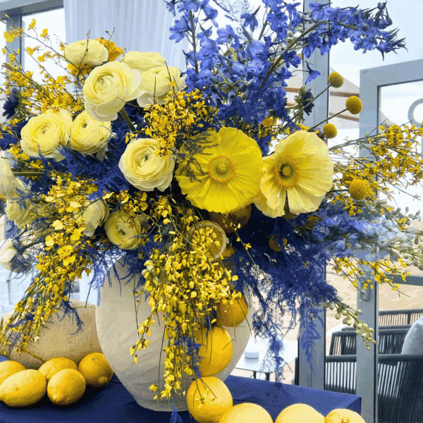 yellow and blue flowers compositions for MIPIM tent deocration