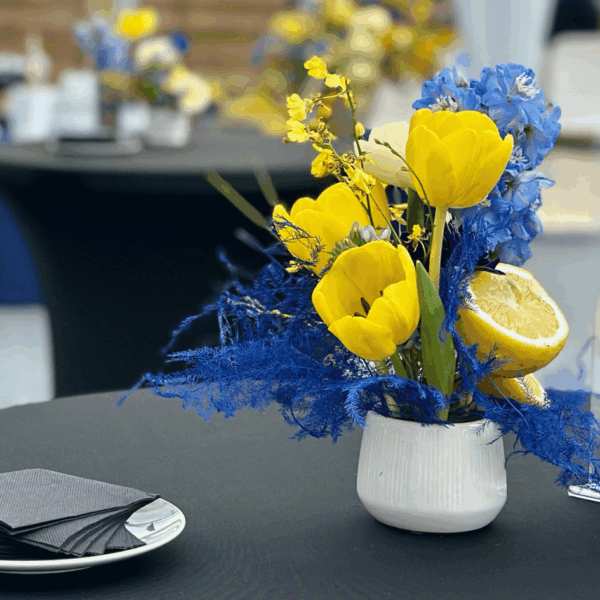 yellow and blue flowers compositions for MIPIM tent deocration