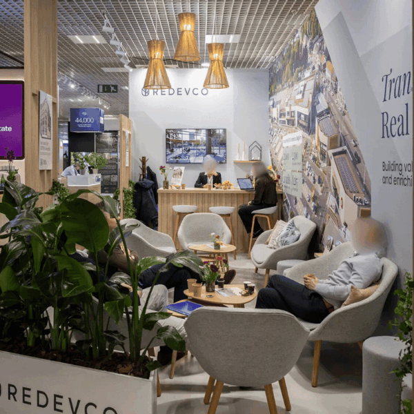 Stand viewed from the side of the alley during MIPIM inside Le Palais Des Festivals