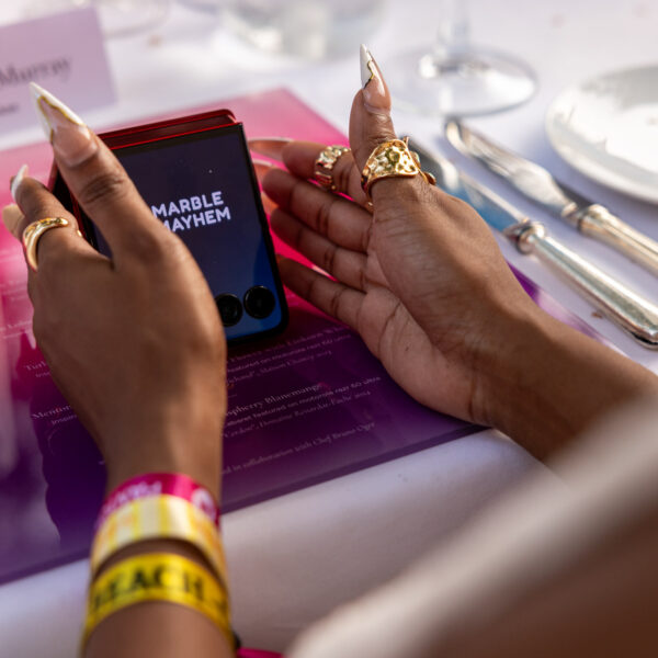 Content creator discovering the flip phone during the dinner