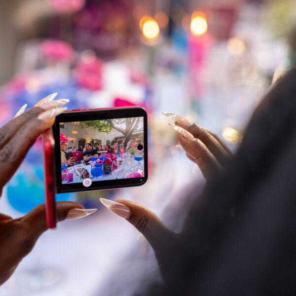 Content creator discovering the flip phone during the dinner