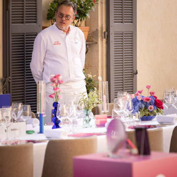 Before the content creators dinner, the chef reviewed the tables set-up