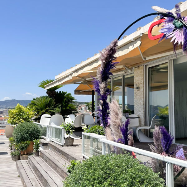Cannes Lions 2022 penthouse terrace with floral photocall arch