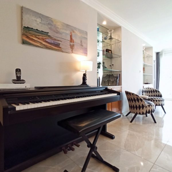 piano in the living room of the apartement facing le palais des festivals in cannes