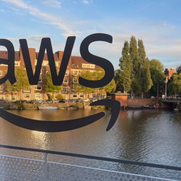 Customer branding on the windows with Amsterdam canals on the background