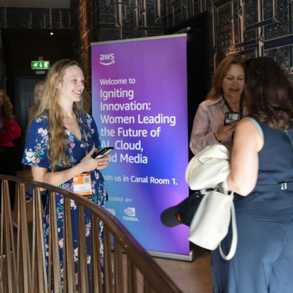 the marketing team welcoming and scanning the guests upon arrival