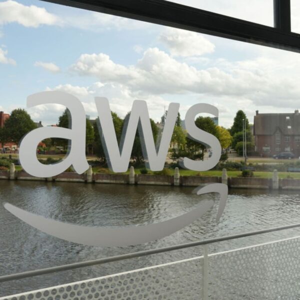 the customer logo on the window with the canals of Amsterdam in the background