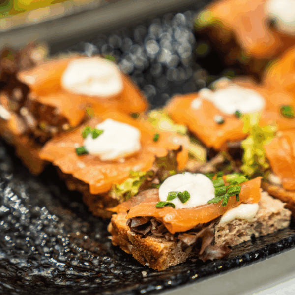 Sophisticated food served on tray during happy hour at the booth in Munich