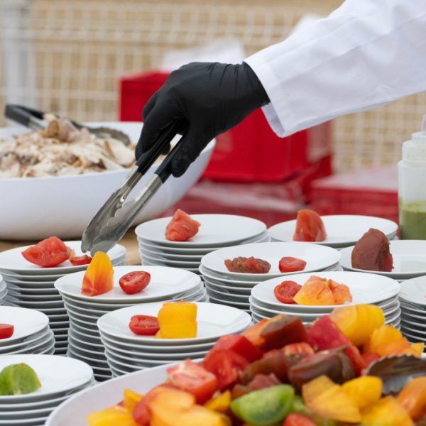 mozzarella bar with tomatoes being served in small dishes