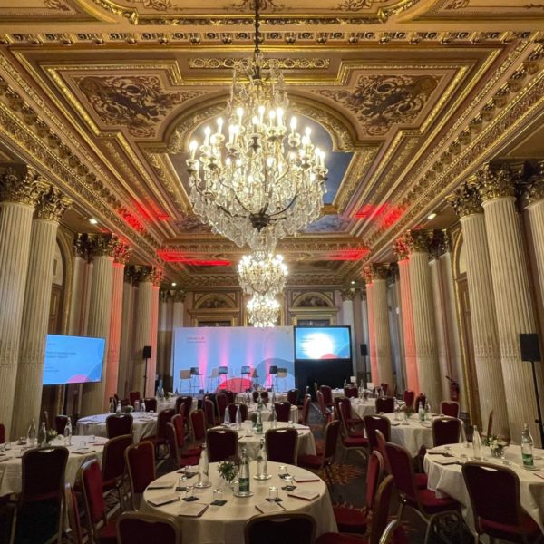 General view of the plenary room within the historical listed ballroom with high ceiling including paintings and chandeliers