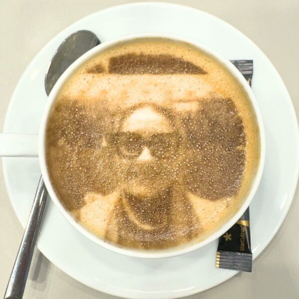 Coffee cup with our event manager