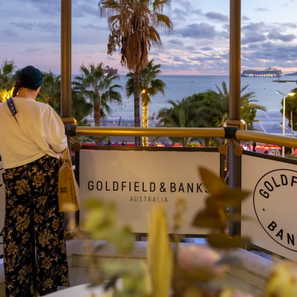 branded terrace on the croisette at sunset with a beautiful pink an purple sky and yachts