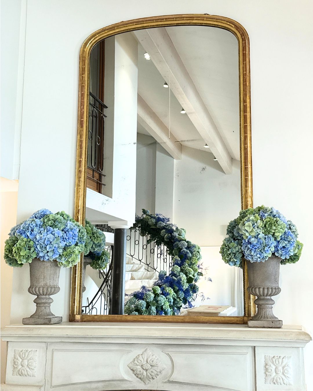 mirror in hospitality in Cannes with flowers reflection from the venue decoration